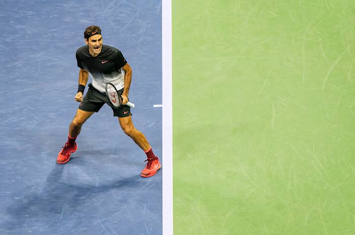 Roger Federer celebrates his third-round, three-plus-hour win against Mikhail Youzhny at the 2017 U.S. Open.